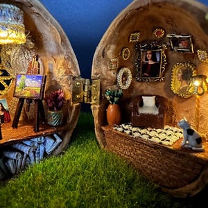 May include: A set of three ceramic mugs with a speckled, matte finish. Each mug features a different color: light blue, cream, and gray. The mugs have a simple, modern design with a rounded shape and a comfortable handle.