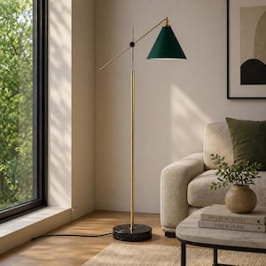 May include: A floor lamp featuring a slender gold-toned metal pole, a circular black marble base, and a dark green conical shade. The lamp has an adjustable arm mechanism with a small black accent piece, providing a focused downward light source.