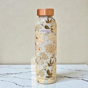 Juego de botellas de cobre puro con estampado floral esmaltado. Bottle