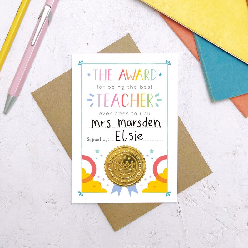 May include: A colorful card with a gold seal that says "The Award for being the best Teacher ever goes to you Mrs. Marsden Signed by: Elsie".