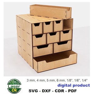 May include: A wooden organizer with multiple drawers and compartments. The organizer is made of light-colored wood and features a variety of drawer sizes. The text "digital product" is visible. The image also includes the text "3 mm, 4 mm, 5 mm, 6 mm, 1/8", 1/6", 1/4"" and "SVG - DXF - CDR - PDF".