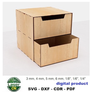 Può includere: Una scatola di legno a due cassetti con finitura marrone chiaro. Il cassetto superiore è chiuso, mentre il cassetto inferiore è aperto. La scatola è realizzata in compensato e ha un design semplice e moderno. Il testo "digital product" è visibile.