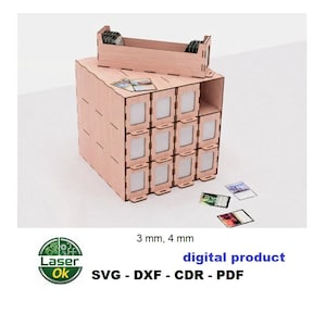 May include: A light brown wooden card storage box with multiple compartments and a separate top tray. The box is designed for organizing cards. The text "digital product" and "SVG - DXF - CDR - PDF" are visible.
