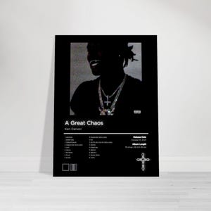May include: Black poster featuring the album "A Great Chaos" by Ken Carson. The album art includes a grayscale image of a person wearing jewelry. The poster also lists the release date, album length, and song titles.