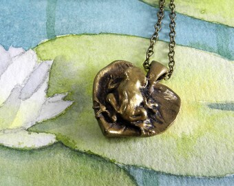Kiss the frog – cast brass pendant on a brass chain – treefrog on a heart-shaped leaf