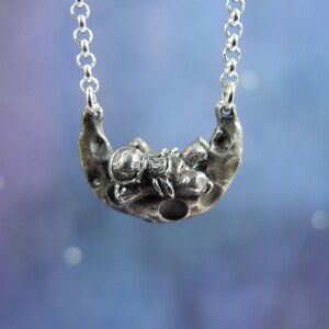Catena in argento con miniatura di un astronauta in argento fuso - gioielli spaziali