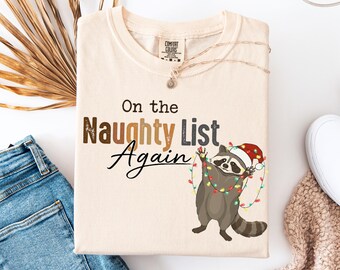 Comfort Colors®On The Naughty List(Again)Shirt, Funny Christmas Racoon Tee, Christmas Raccoon Shirt, Christmas Gift, Festive Raccoon Sweater