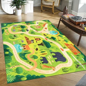 May include: A rectangular children's play rug with a vibrant green background and a playful road map design. The rug features illustrations of animals like elephants and giraffes, along with trees, a lake, and a winding road.