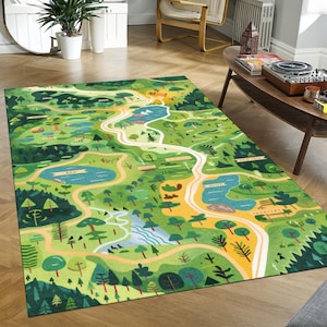 May include: A rectangular rug with a map design. The rug depicts a green landscape with roads, lakes, and trees. The colour scheme includes shades of green, yellow, and blue, creating a whimsical scene. The rug would be a great addition to any room.