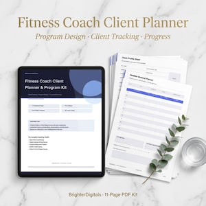 May include: A fitness coach client planner and program kit. The image shows a tablet displaying the planner's interface, alongside printed sheets with workout and client profile templates. The text on the tablet reads "Fitness Coach Client Planner & Program Kit". A glass of water and a sprig of greenery are also present.
