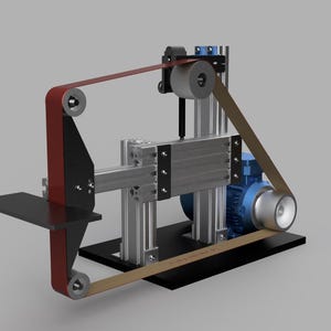 May include: A belt grinder featuring a red abrasive belt, a blue electric motor, and a silver aluminium extrusion frame. The machine includes a black metal work rest, multiple pulleys, and a black base plate, designed for grinding and sanding tasks.