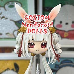 May include: A set of three ceramic mugs with a speckled, matte finish. Each mug features a different color: light blue, cream, and gray. The mugs have a simple, modern design and a comfortable handle.