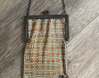 Early 20th Century Whiting and Davis Chainmail evening bag with painted plus motif.