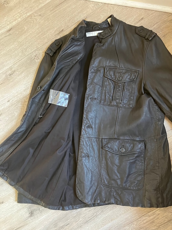 Leather stylized military dress coat. Fancy Epaule