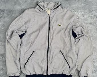 Chaqueta cortavientos con cremallera azul/blanca a rayas de Lacoste, fabricada en Francia, talla 3