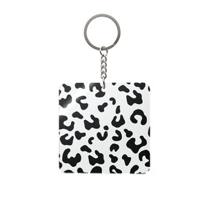 Portachiavi quadrato con stampa leopardata in bianco e nero / Accessorio con stampa animalier