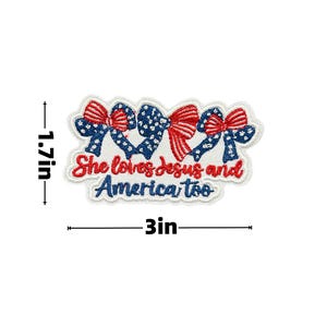 May include: Embroidered patch featuring three bows in red, white, and blue, with a patriotic theme. The patch measures 3 inches wide and 1.7 inches high. Text reads "She loves Jesus and America too."