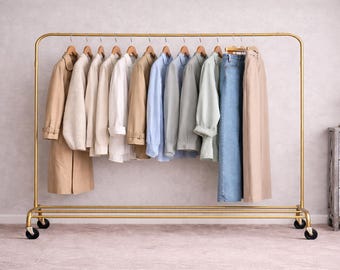Elegant Brass Rolling Garment Rack with Bottom Storage Shelf