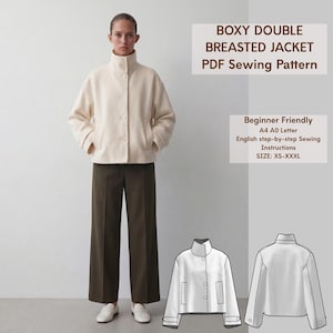 May include: A woman in a cream-coloured, boxy double-breasted jacket with a high collar and dark brown trousers. The image includes a PDF sewing pattern with text that reads "BOXY DOUBLE BREASTED JACKET PDF Sewing Pattern" and "Beginner Friendly".