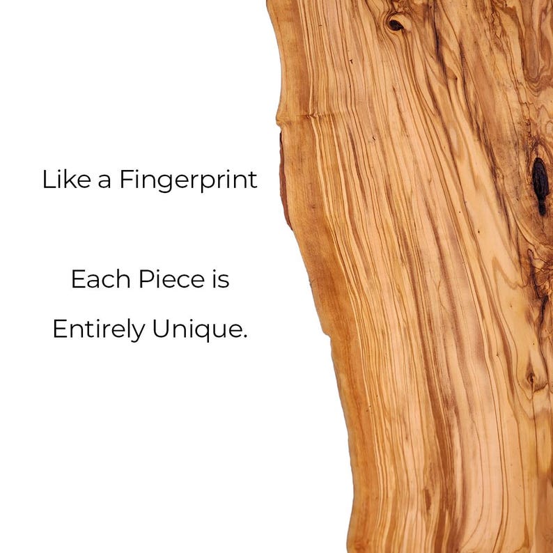 May include: A slab of light brown olive wood with a natural live edge and dark brown grain patterns. The text on the left side reads: Like a Fingerprint Each Piece is Entirely Unique. The wood surface shows organic knots and swirls.