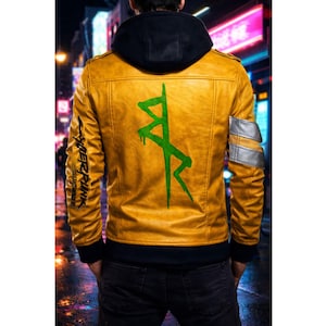 May include: Mustard yellow leather jacket with a black hood. The back features a large green graphic and the text "Cyberpunk Edgerunners" on the sleeve. The jacket has silver and gray accents on the upper arm.