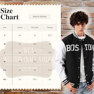 May include: A black and white varsity jacket with the text "BOS. TOV" in white. The image also includes a size chart with measurements in inches for chest, shoulder, and sleeve sizes.