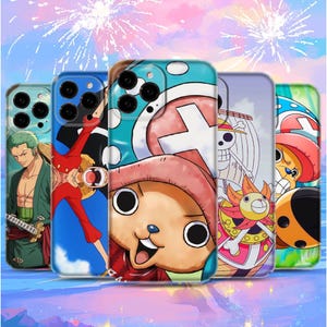 May include: A selection of phone cases showcasing characters from the anime One Piece. Each case displays a different character, with bright colours and detailed artwork. The cases are set against a backdrop of fireworks.
