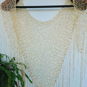 Shiny kerchief, Hand-knitted triangular shawl decorated with sequins, beige