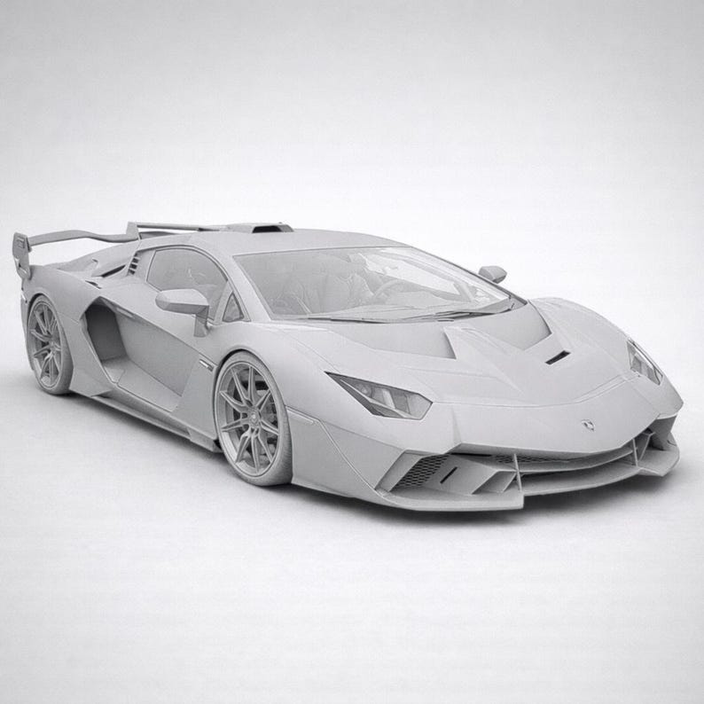 May include: A matte light gray sports car model featuring an aerodynamic body, sharp angular headlights, large multi-spoke wheels, side air intakes, and a prominent rear wing. The vehicle displays a low-profile stance with a sleek hood design.