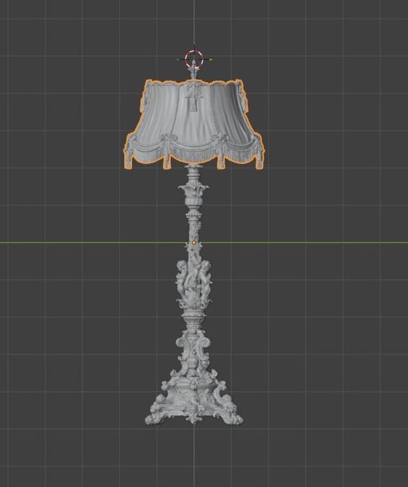 May include: A grey 3D digital model of a floor lamp featuring a wide, pleated lampshade with decorative fringe and tassels. The lamp base is highly ornate, showcasing intricate carvings of cherubs and scrolling floral motifs on the stand.