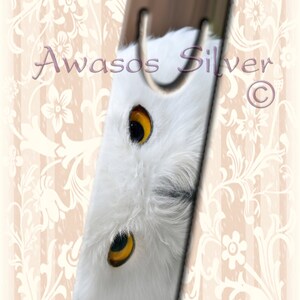 Metal bookmark with high quality printed original images. Beautiful image of a Snowy Owl&#39;s eyes on metal bookmark. High quality bookmark.