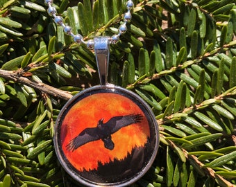 Flying Raven in the full moon pendant necklace. Full moon flying raven necklace. Flying Raven with full orange moon pendant. Raven Necklace