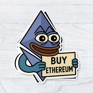 May include: A sticker depicting a cartoon character with a blue diamond-shaped head and a brown mouth, holding a sign that says "BUY ETHEREUM". The character has large eyes and is set against a white wooden background.