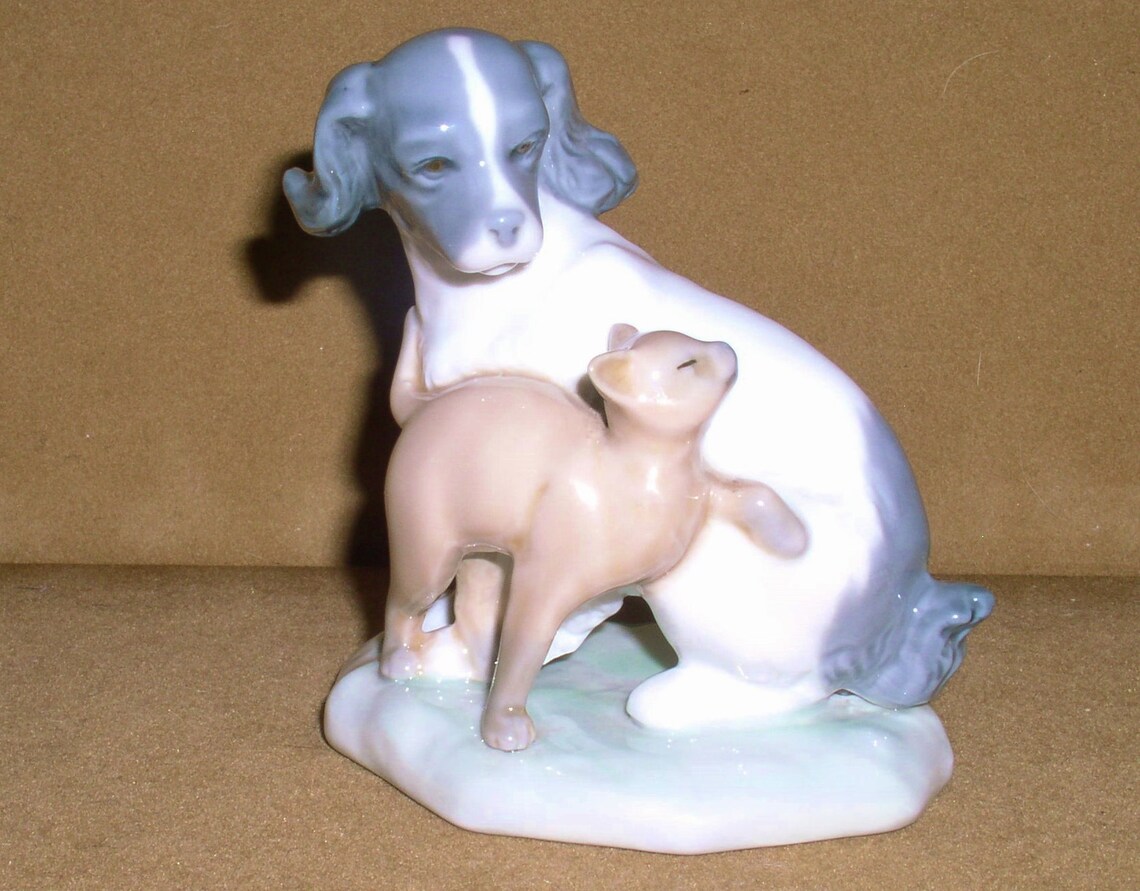 lladro dog and snail