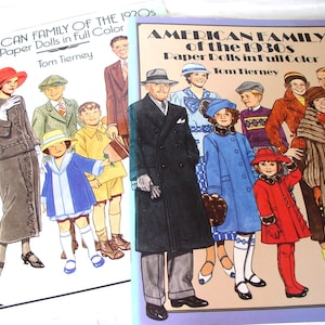 May include: Two paper doll books by Tom Tierney titled American Family of the 1920s and American Family of the 1930s. The covers feature colorful illustrations of families dressed in period clothing, including coats, hats, and dresses in various styles.