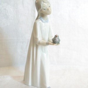Lladro - Girl holding bird in hand - Replaces original candle #4868