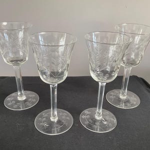 Set of four  vintage etched floral stemmed small crystal  liquor glasses vintage barware