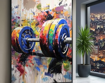 May include: Abstract art print featuring a barbell with vibrant weight plates. The weights are blue, orange, yellow, and green, with black numbers. The background is a splash of paint in various colours. The artwork is framed in a black frame.