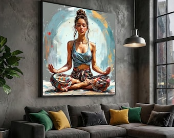 May include: A framed print shows a person in a yoga pose, seated with legs crossed and hands in a meditative gesture. The person wears a blue top and patterned trousers. The background features a soft, abstract design with blue and orange hues. The artwork hangs above a grey sectional sofa.