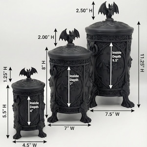Size comparison chart showing three gothic bat canisters in small, medium, and large sizes, with labeled height, width, topper height, and interior storage depth measurements for each decorative dark storage container.