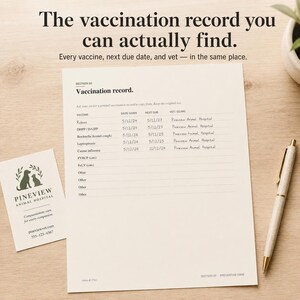 May include: A vaccination record sheet with a pen and business card on a wooden surface. The sheet lists vaccine names, dates given, and due dates. The business card has a logo and contact information.