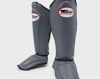 Espinilleras de cuero Twins Special para entrenamiento de muay thai, kickboxing y MMA