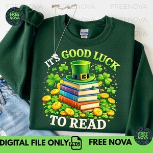 May include: Dark green sweatshirt with the text "IT'S GOOD LUCK TO READ" and a graphic of a green leprechaun hat on top of a stack of books, surrounded by shamrocks and gold coins. The sweatshirt has a crew neck.