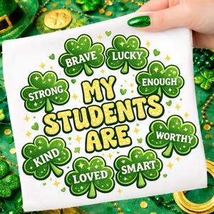 May include: White square cloth with the text "MY STUDENTS ARE" in yellow, surrounded by green shamrocks with words like "BRAVE", "LUCKY", and "STRONG". The background is green with gold coins and shamrocks.