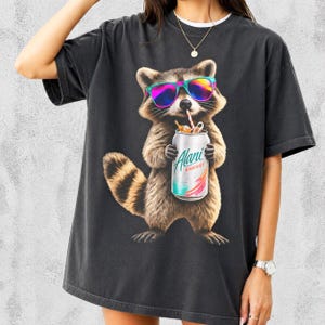 Raccoon Drinking Alani Energy Drink T-Shirt, Quirky Animal Graphic Tee image 1