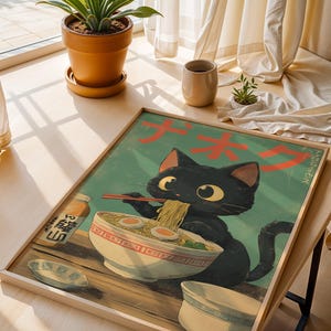 May include: A framed poster featuring a black cat enjoying ramen. The cat is depicted with large yellow eyes and is holding chopsticks. The poster has Japanese text and a vintage aesthetic. A bottle of sauce and a bowl are also visible.