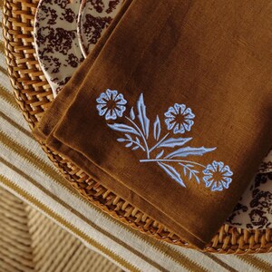 Pyrex Corningware Blue Cornflower Branch machine embroidery design embroidered on a kitchen towel