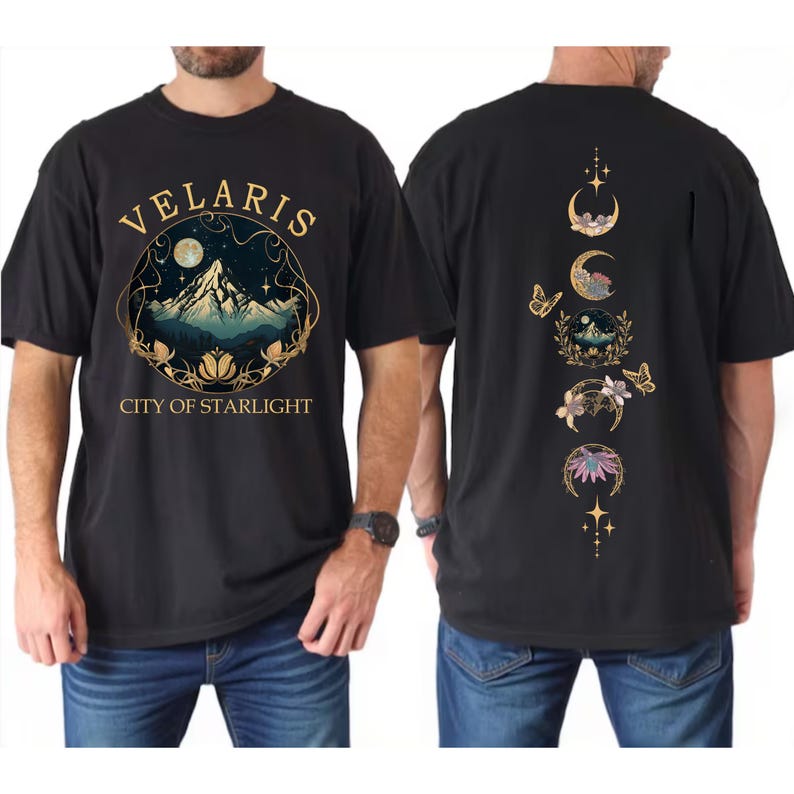 May include: Black t-shirt with "VELARIS CITY OF STARLIGHT" text and a mountain scene graphic on the front. The back features a design of crescent moons, butterflies, and floral elements in gold and other colors.