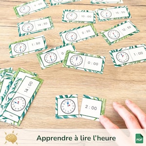 Op de afbeelding: Een set van drie keramische nestkommen in oplopende maten. De kommen hebben een gespikkelde, matte afwerking in crème, lichtbruin en donkerbruin. De grootste kom heeft een diameter van ongeveer 20 cm.