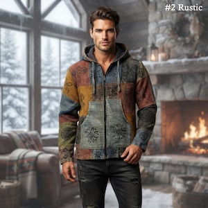 May include: A zip-up hoodie featuring a patchwork design with various earth-toned fabric squares in shades of brown, blue, and green. The garment includes a hood with drawstrings, a front zipper, and black floral patterns printed on each panel.